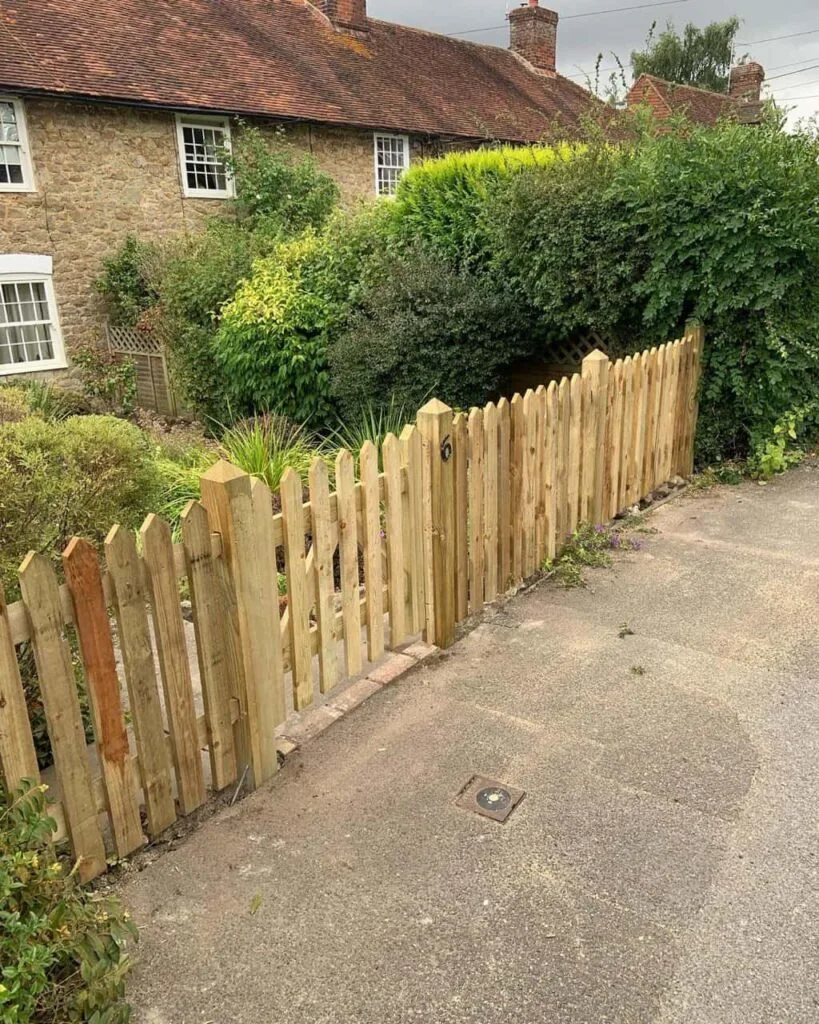 This is a photo of a picket fence and picket gate installed by Fast Fix Fencing Tunbridge Wells